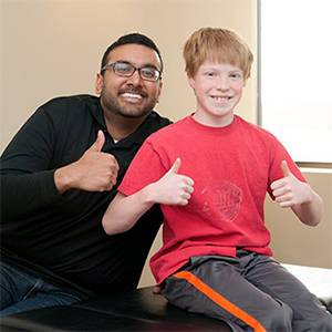 Chiropractor Blaine MN Dave Oommen and Athlete